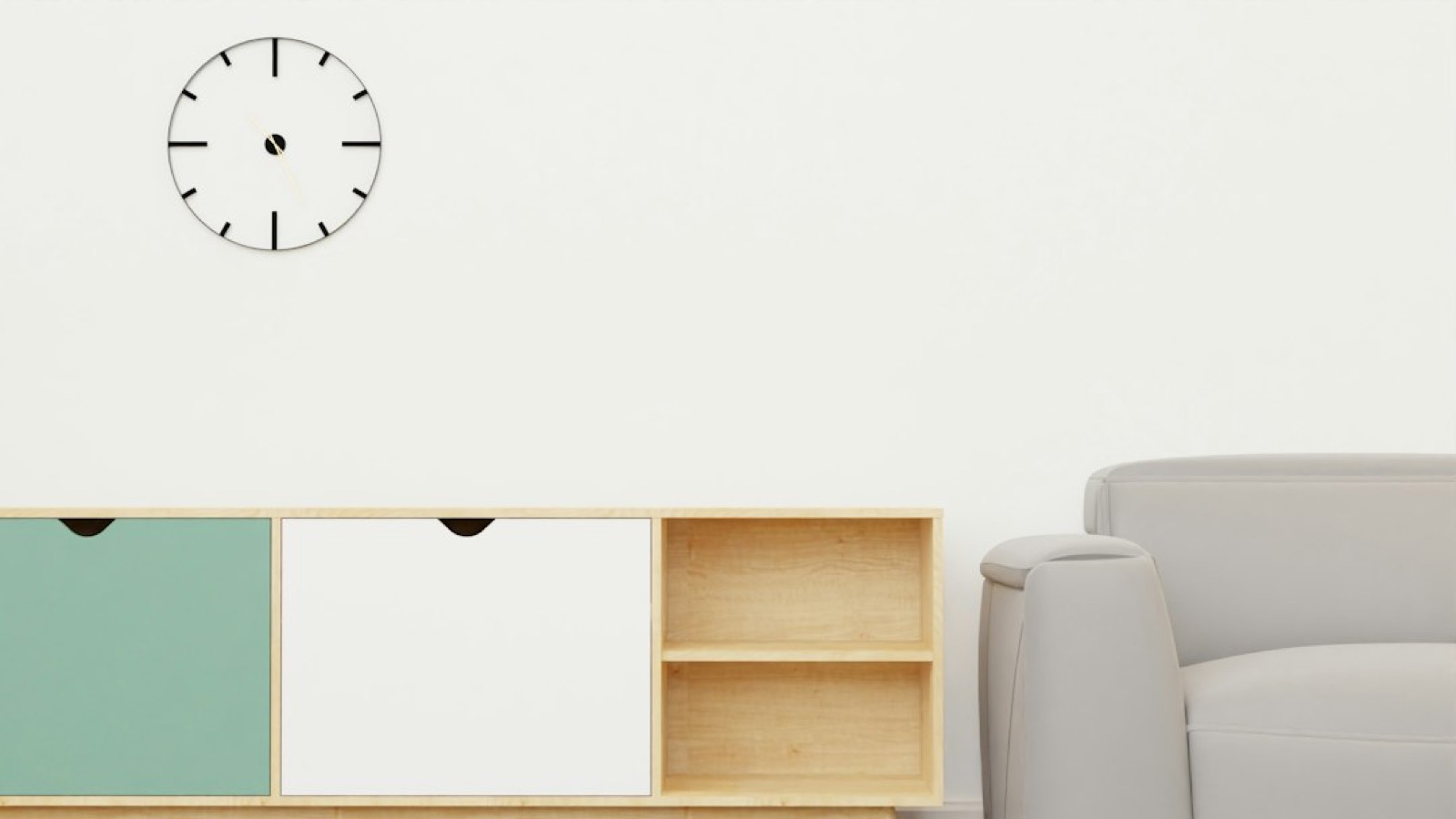 Télémètre laser utilisé contre un mur pour mesurer une pièce d'appartement